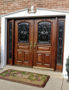 Two front doors on a house.