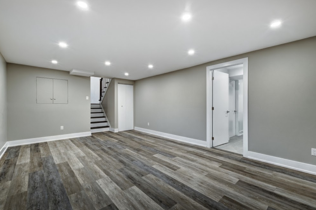 Remodeled basement with LED lights