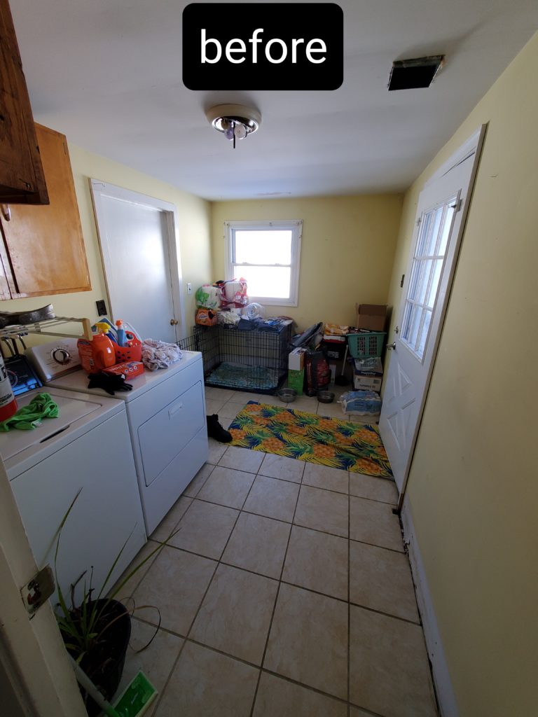 Laundry and dog room before a renovation.